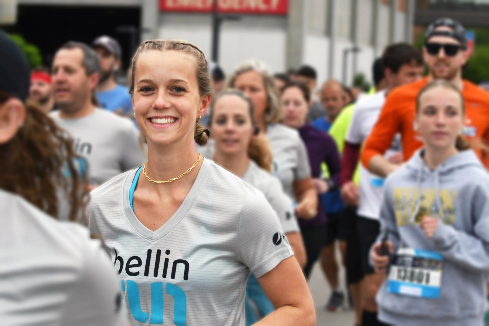 Girl at Bellin Run start line, smiling