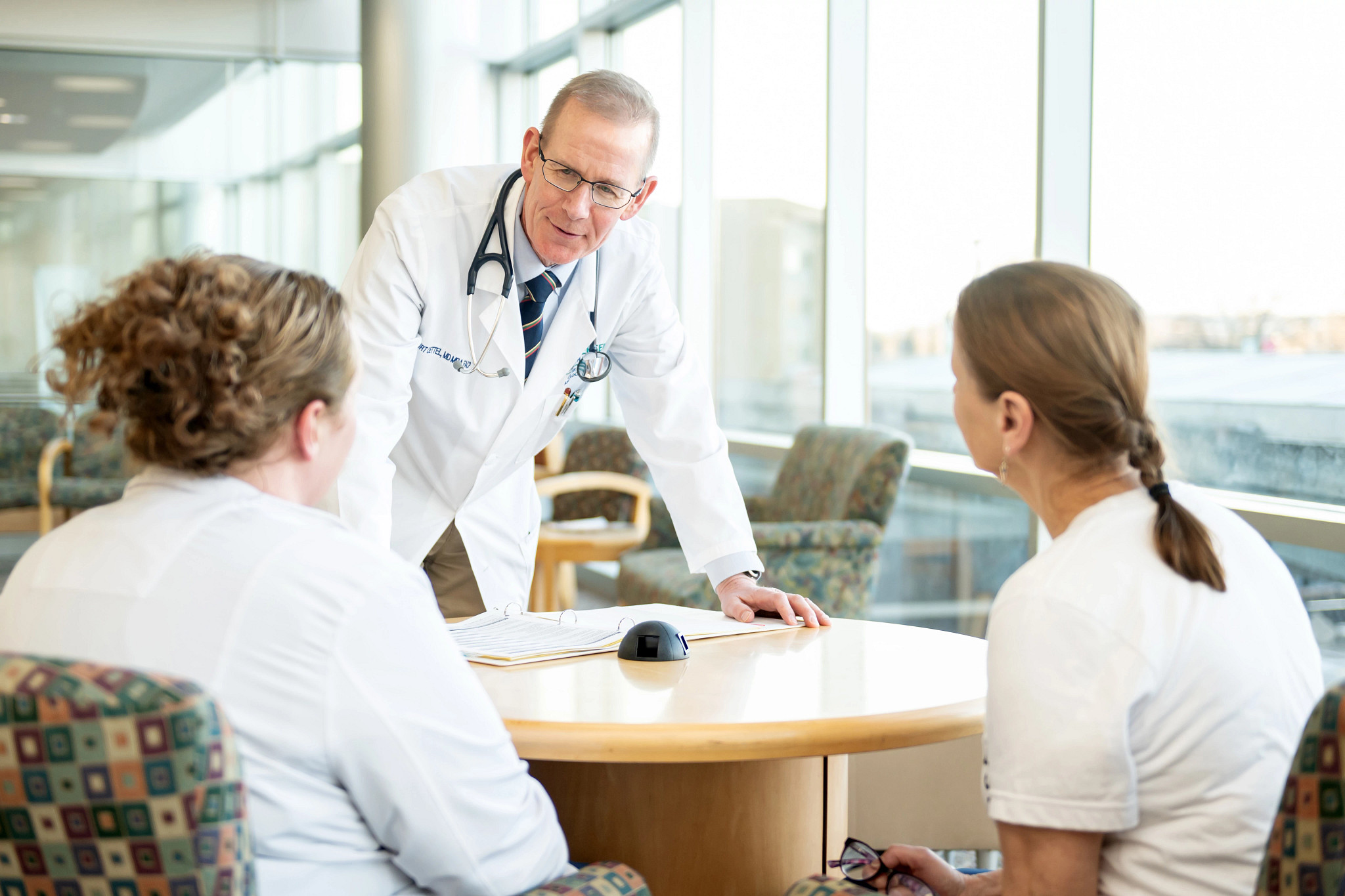 Cancer physician meeting with clinical trials at Gundersen participants.