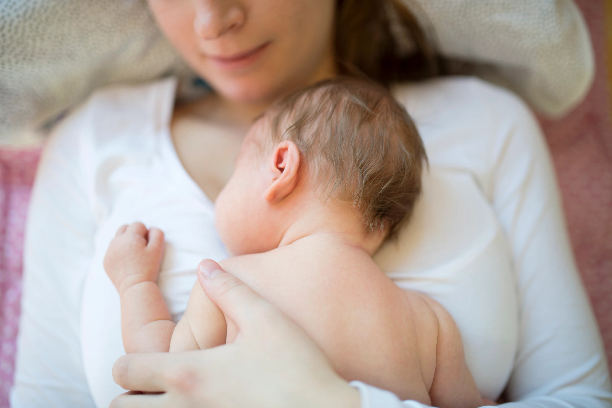 newborn-laying-on-mothers-chest-gettyimages-649363946.jpg