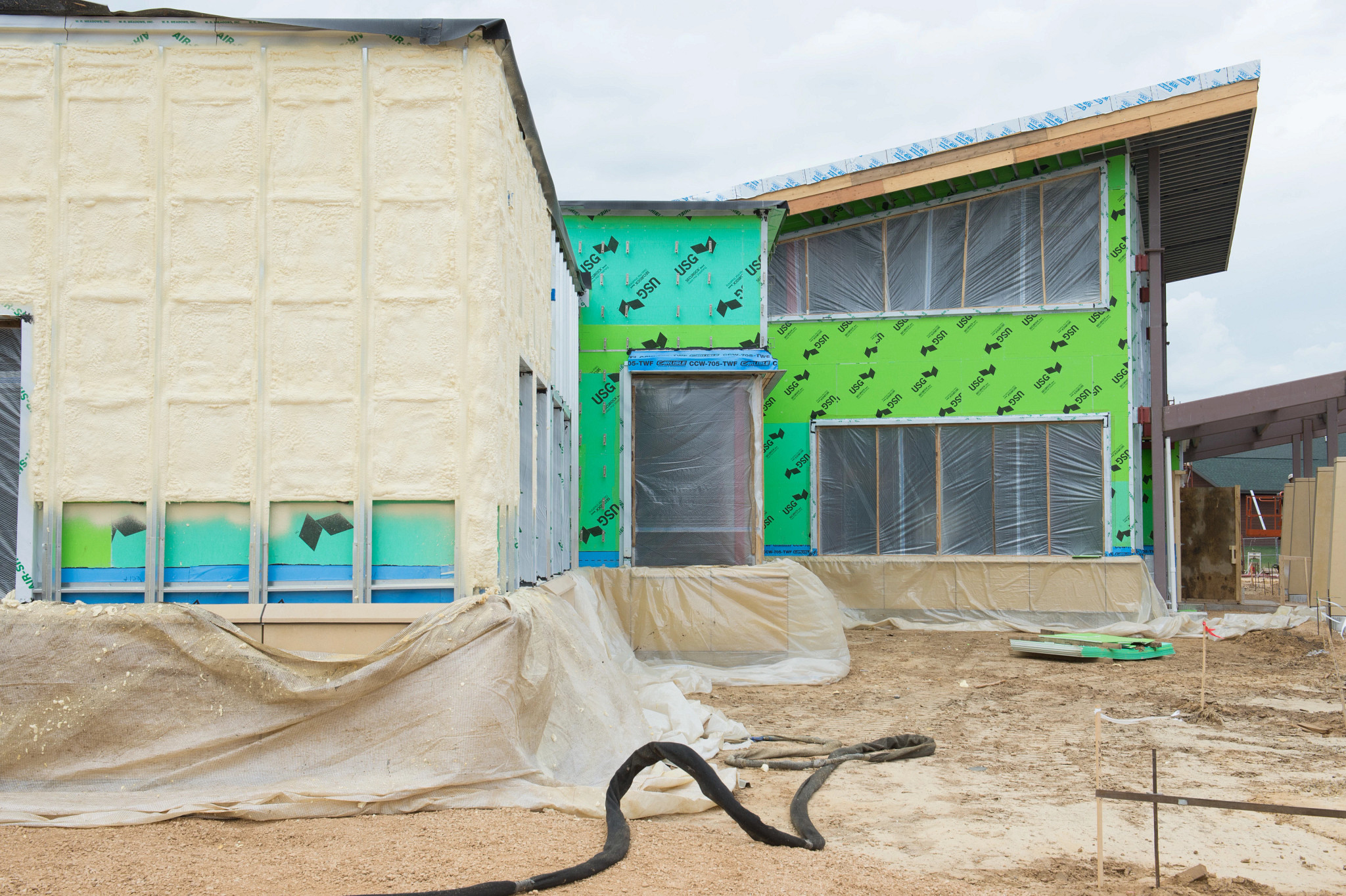 Insulation on exterior clinic walls to conserve energy.