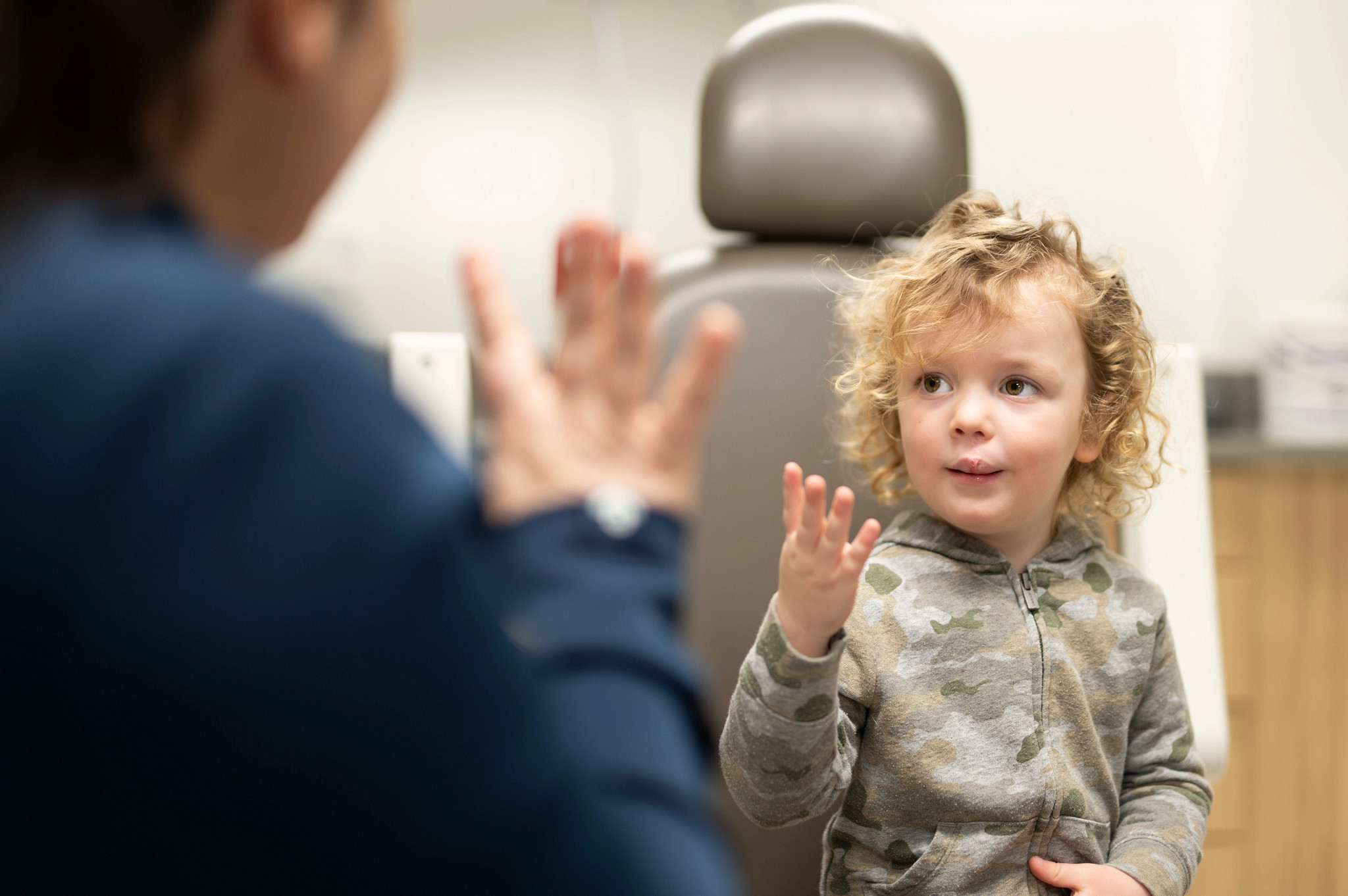 Wesley Schaller working with a speech therapist at a recent cleft clinic appointment.