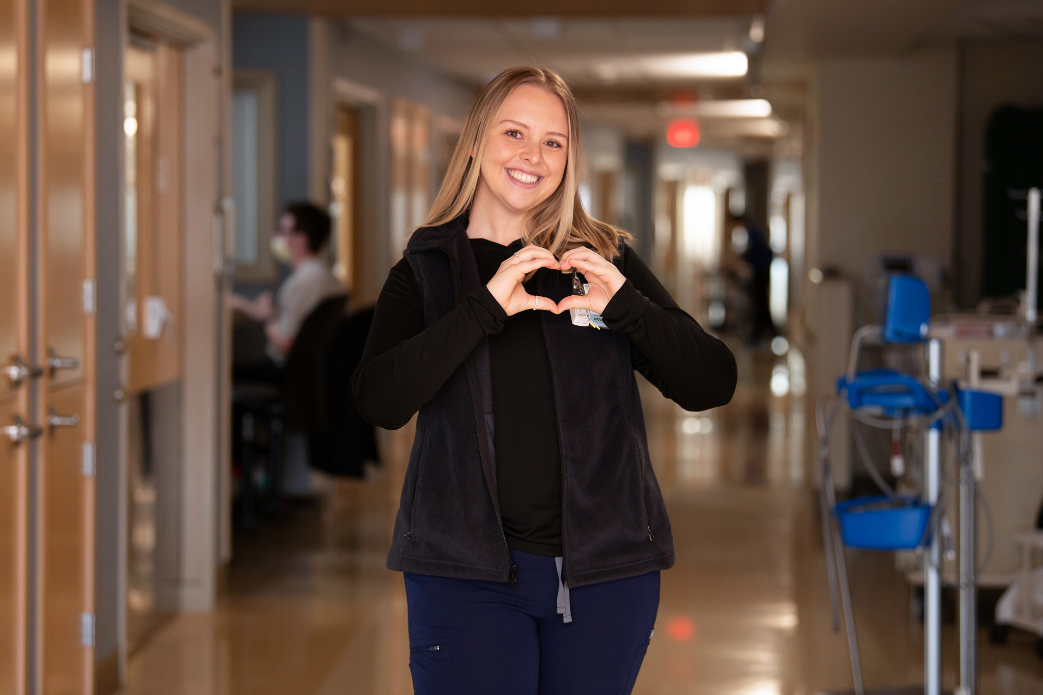 nurse-holding-her-hands-in-heart-shape