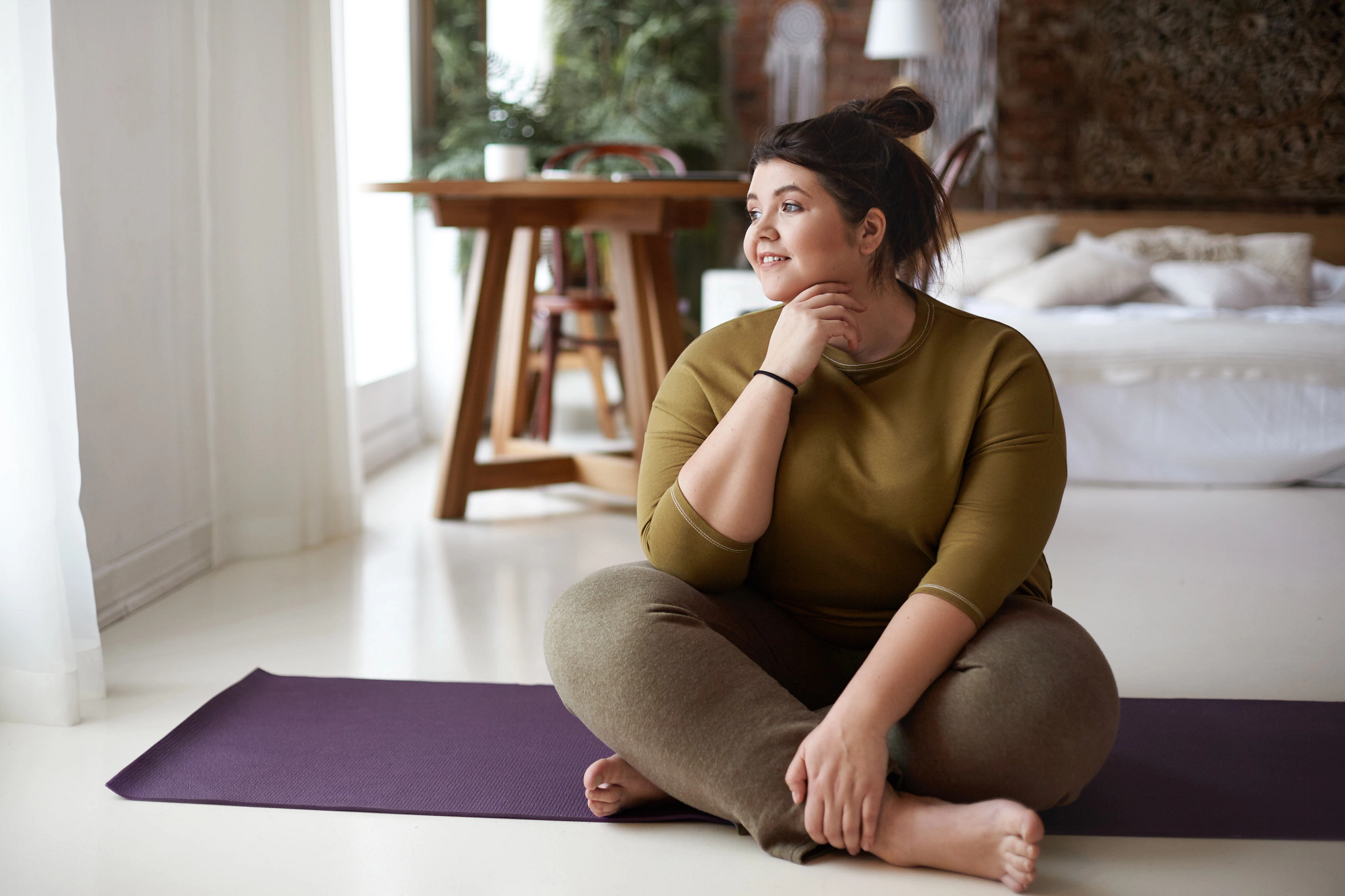 Young woman in sportswear for yoga