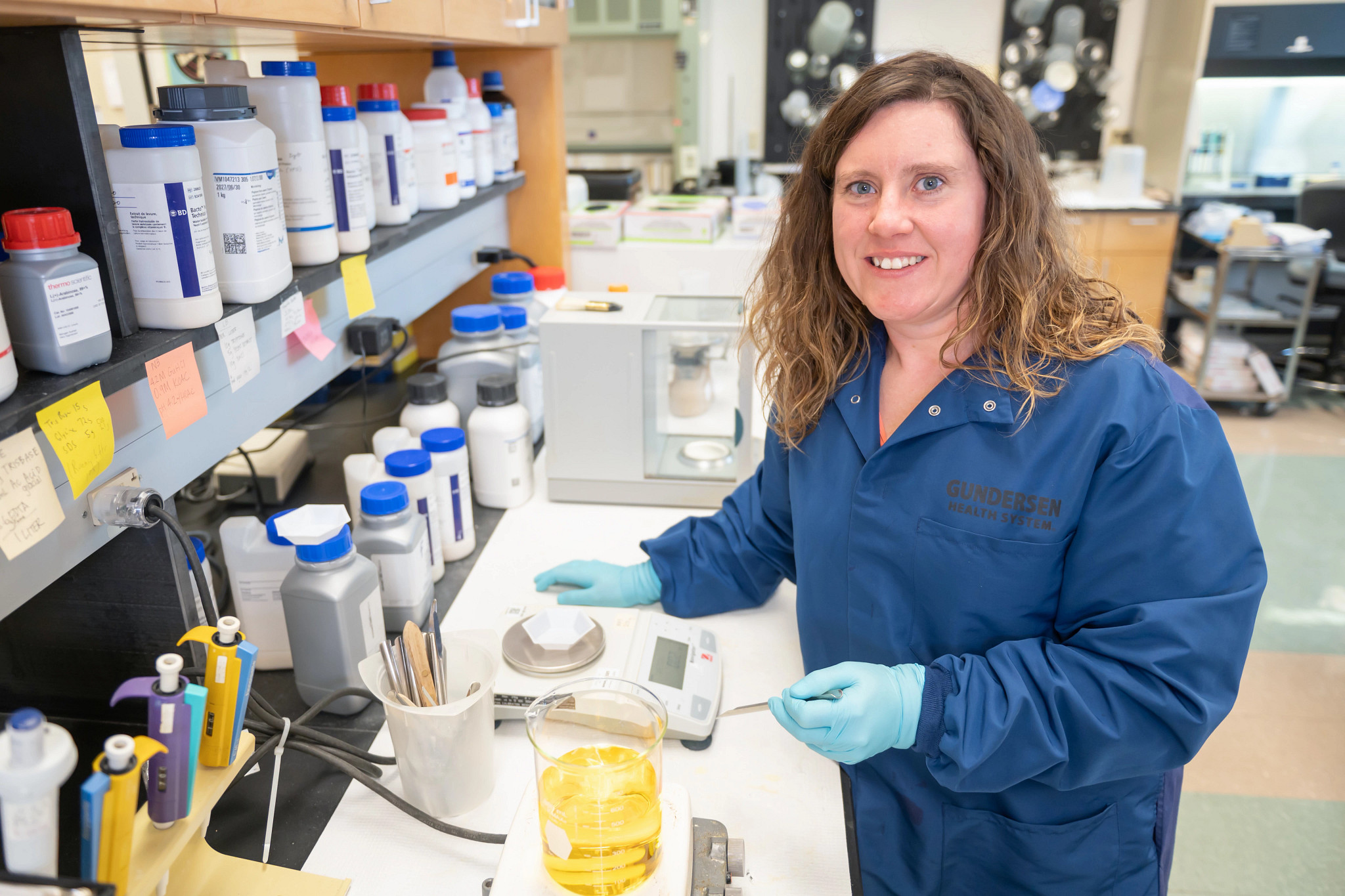 Female lyme disease researcher in research lab.