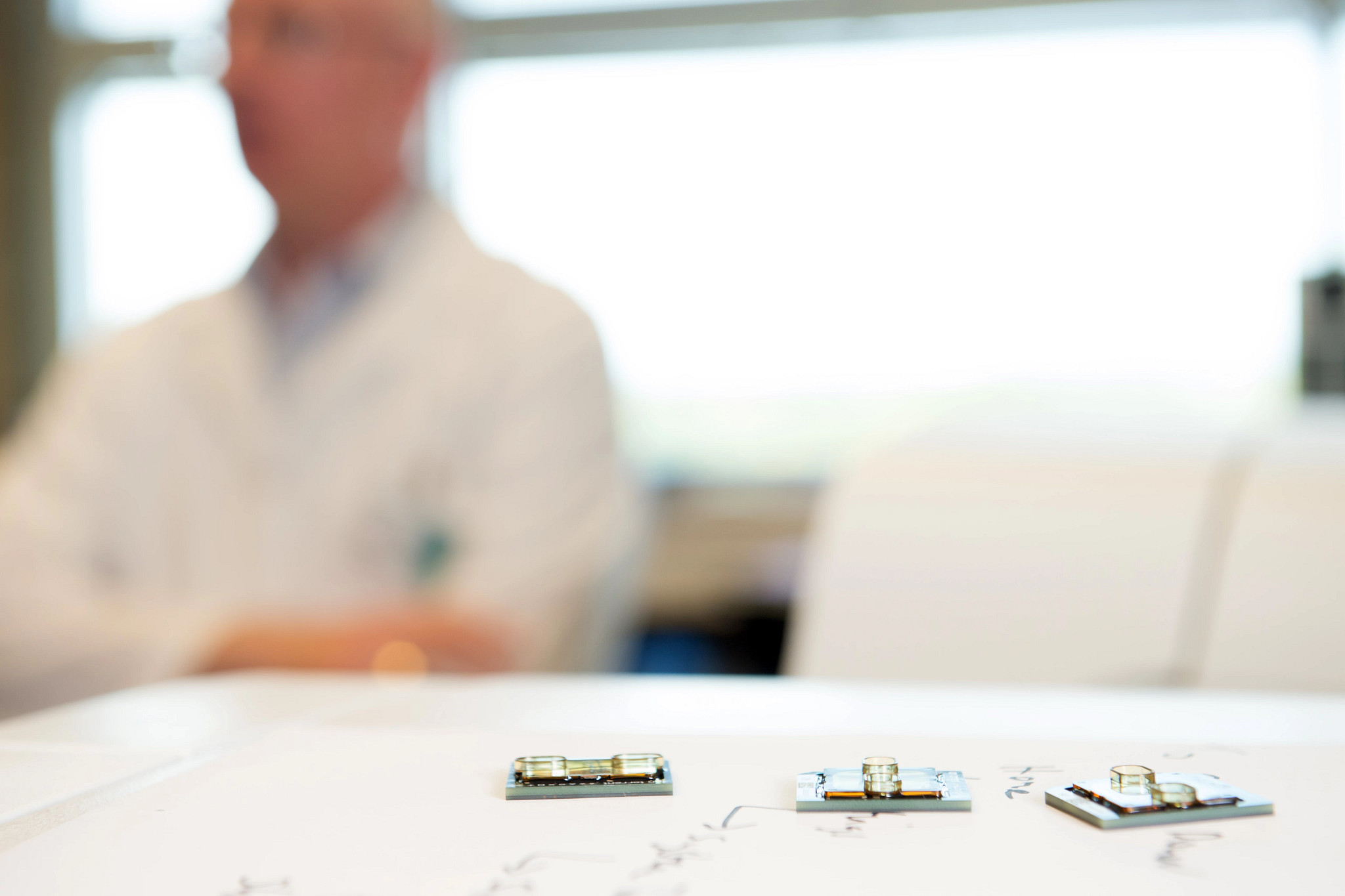 Cancer-researcher-with-cancer-research-tools-in-lab.