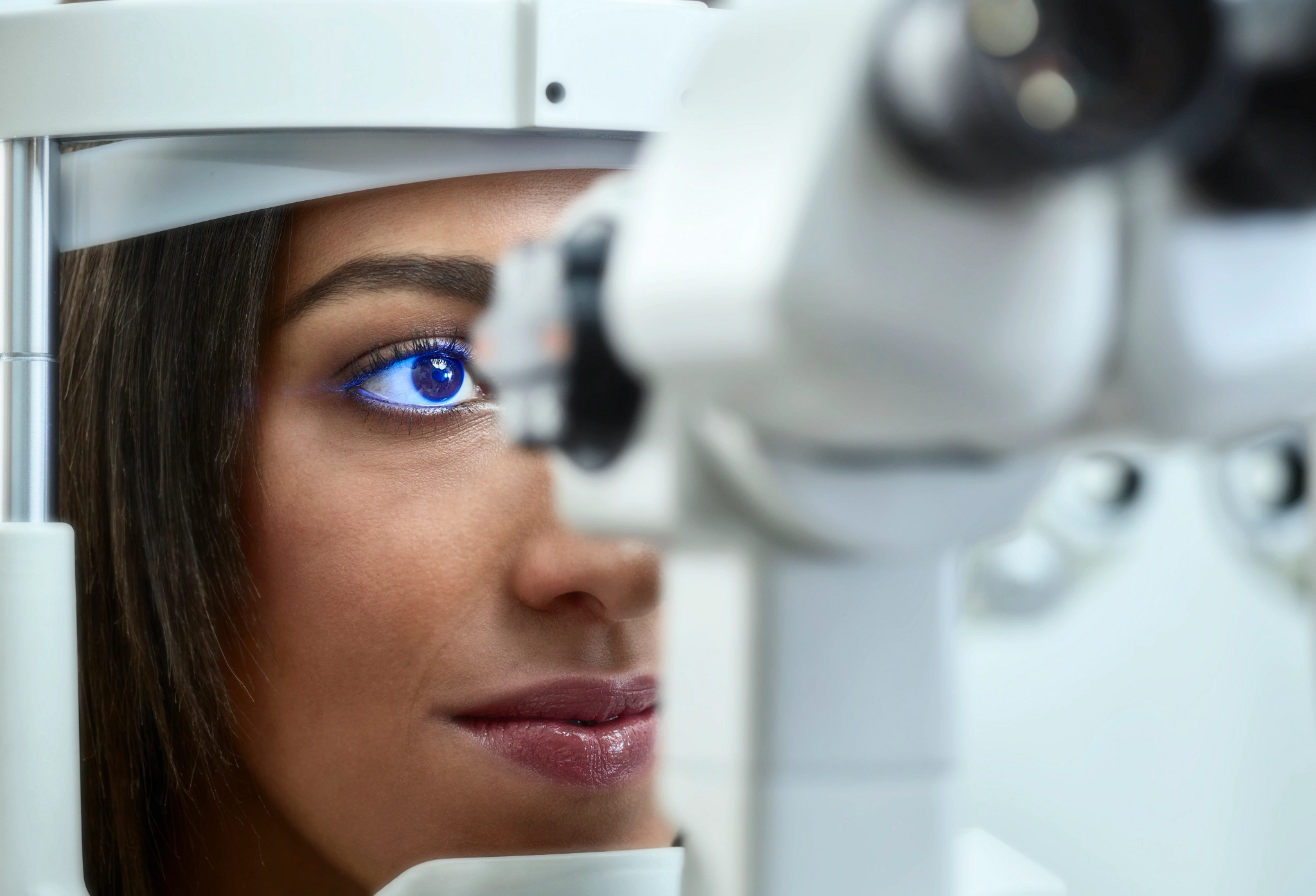 Young woman recieving eye exam