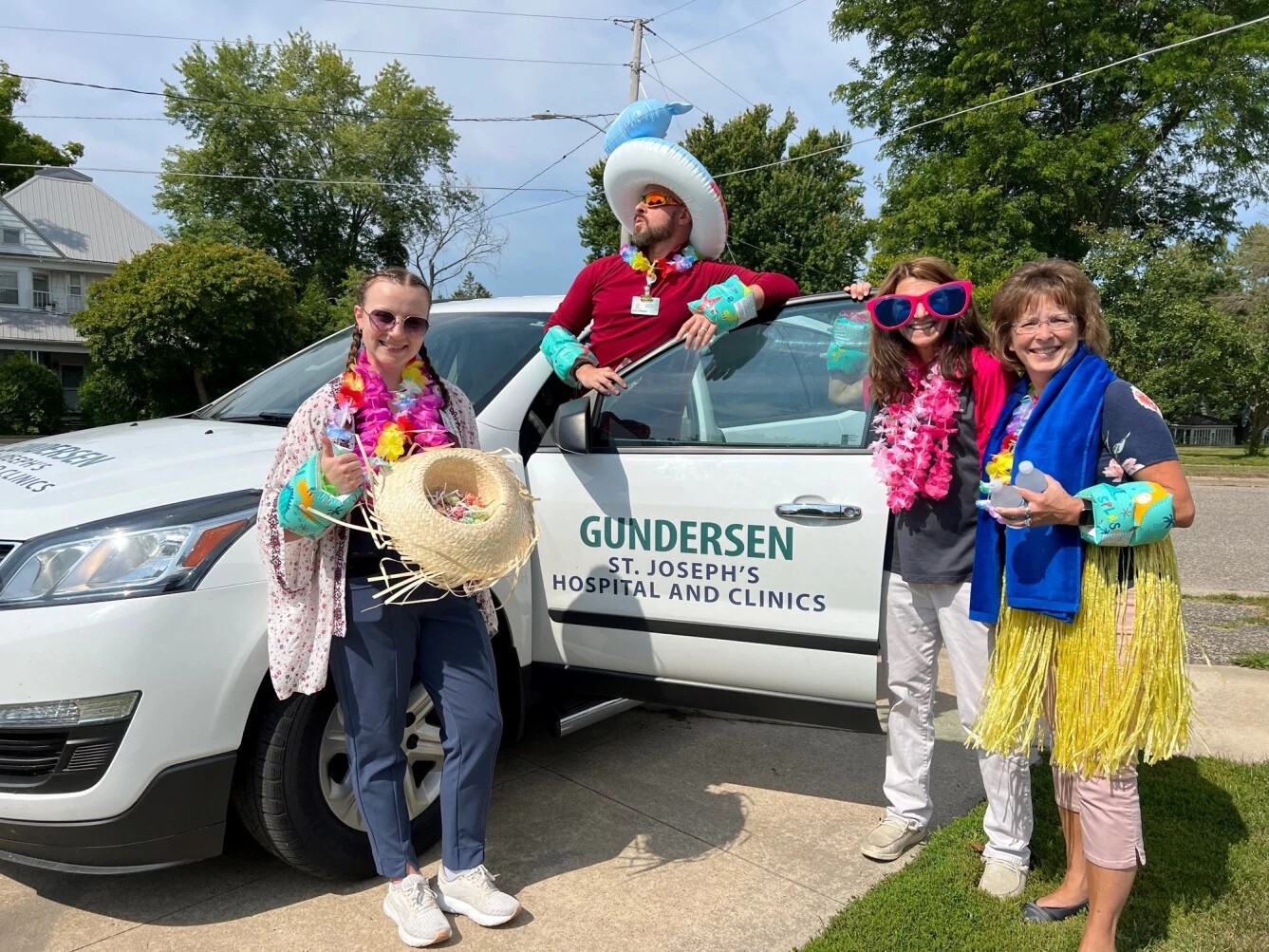 gundersen-colleagues-at-parade-smiling.jpg