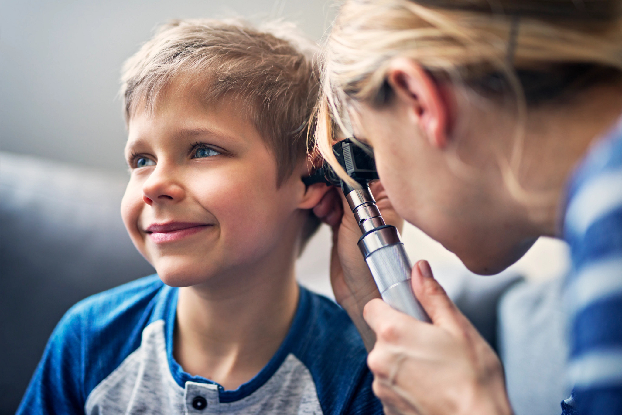 gettyimages-649286422_happy-boy-having-ear-exam.jpg