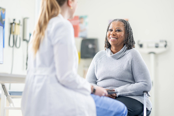Patient talking with doctor during medical visit