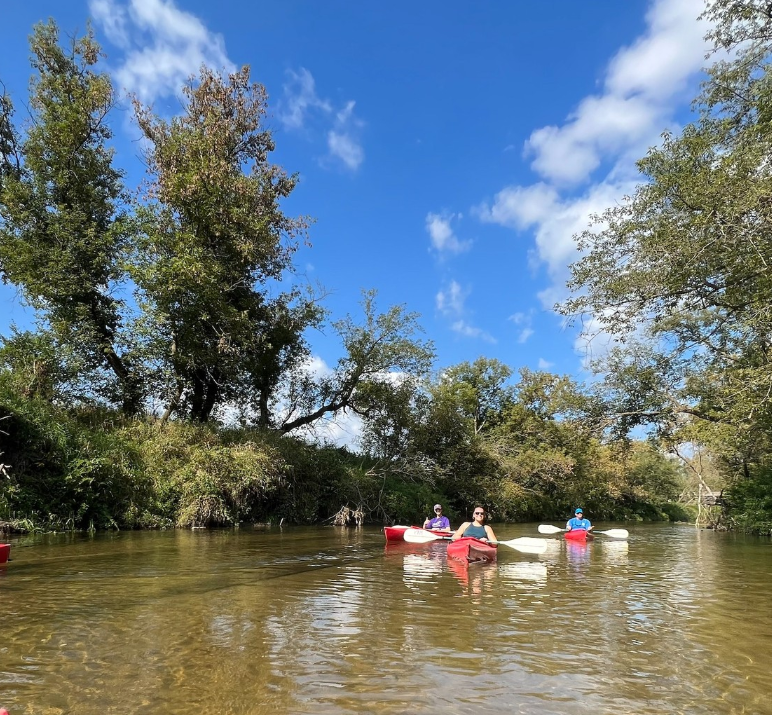 Residents kayaking the Kickapoo river.