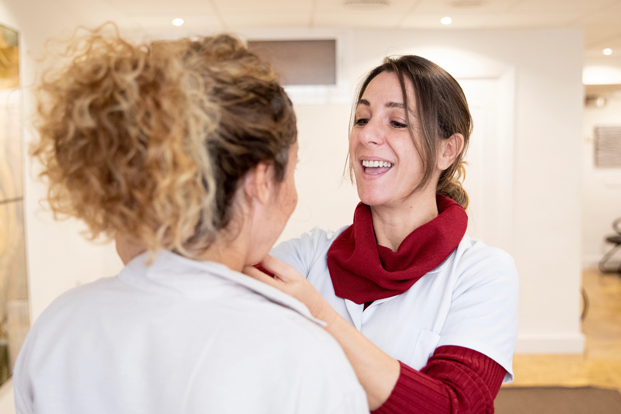 Speech therapist helping patient