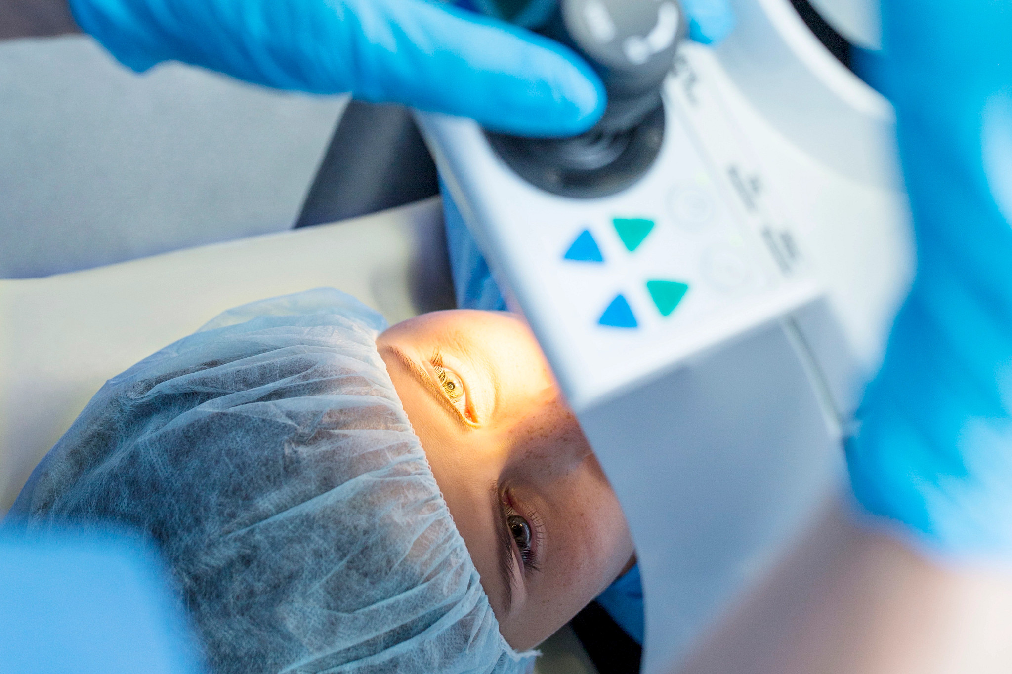 Patient undergoing laser eye surgery.