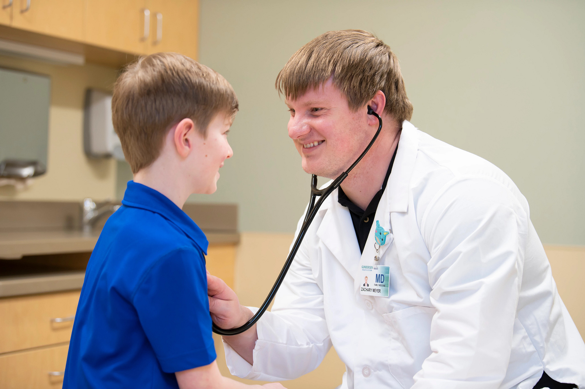 male-doctor-examining-child-male-patient.jpg