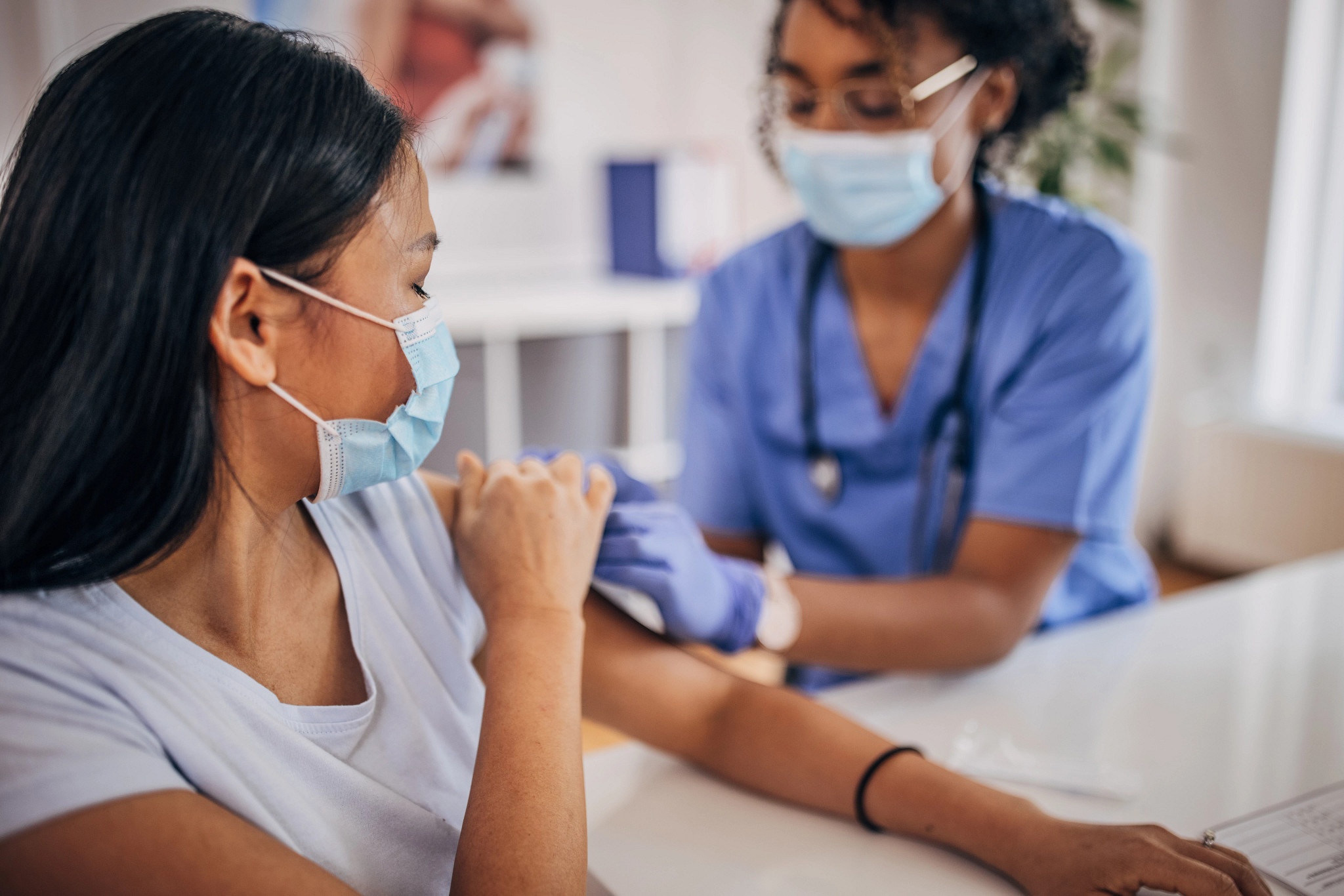 Woman receiving a vaccine