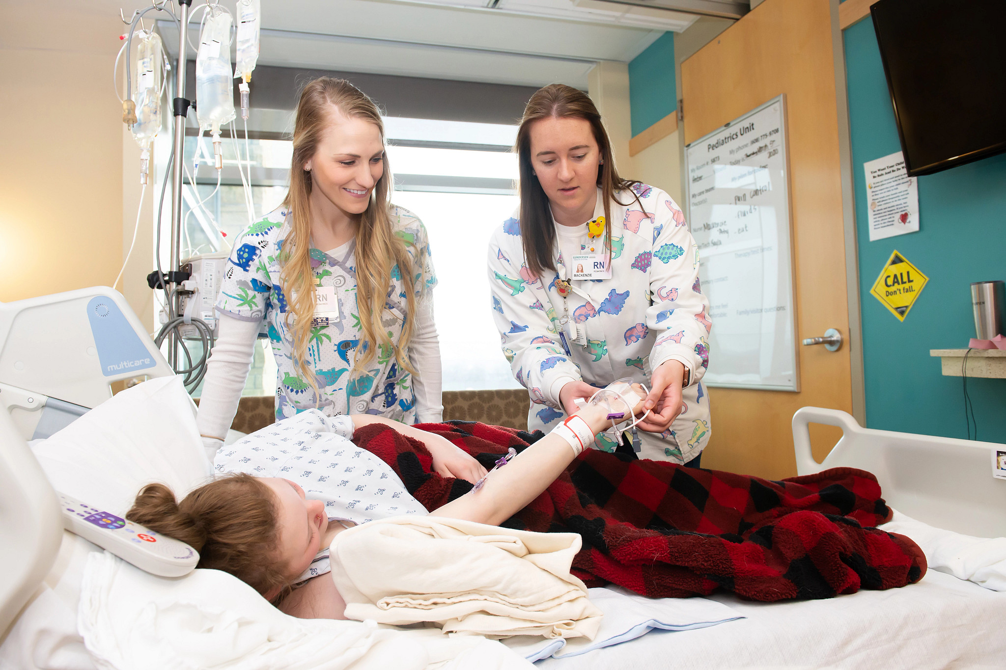 two-nurse-interns-practicing-iv-care-in-hospital