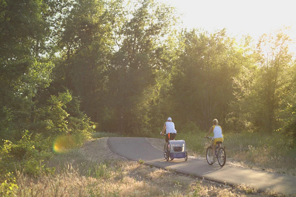 family-biking-on-la-crosse-trail