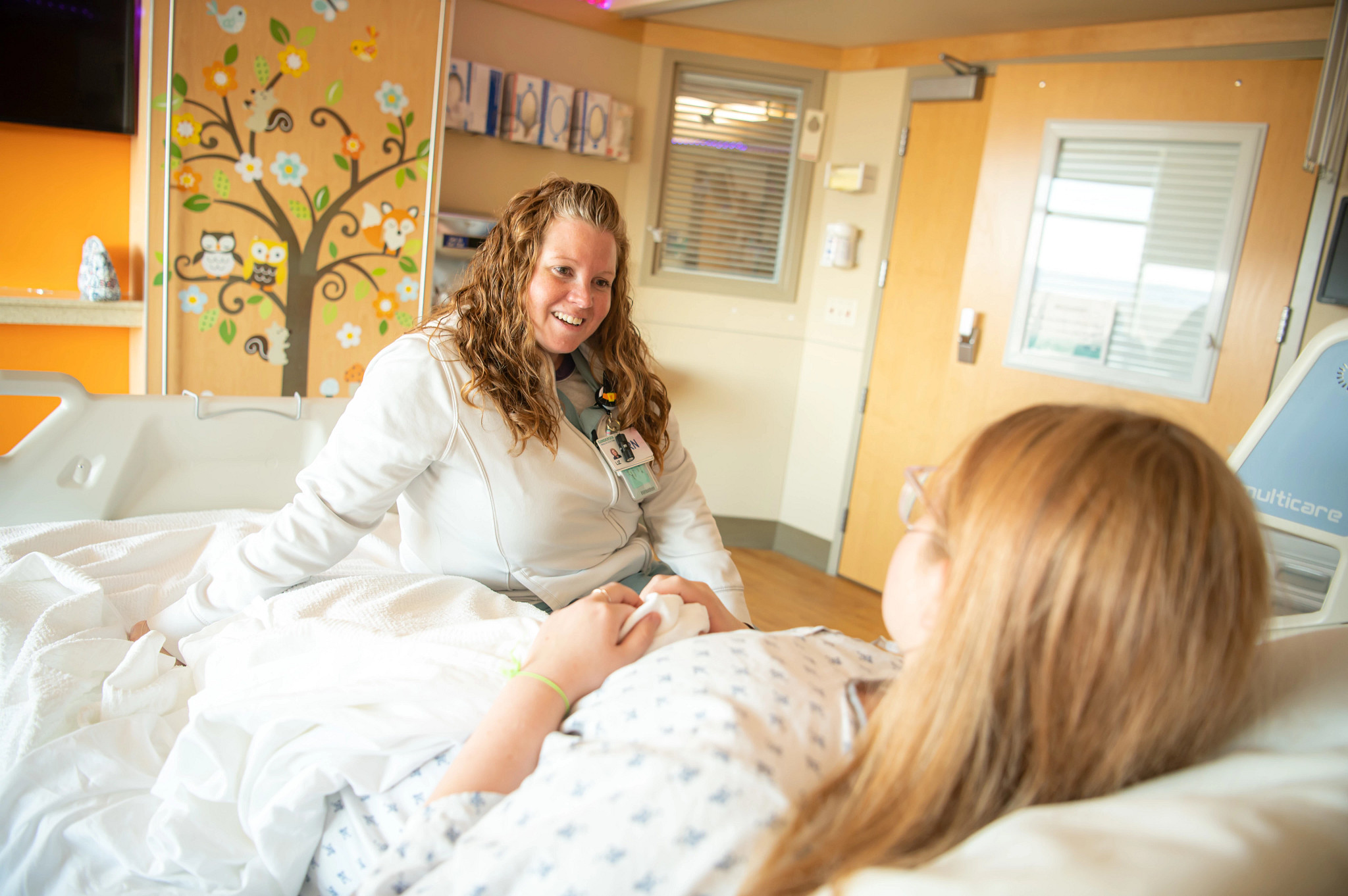Pediatric nurse with patient.