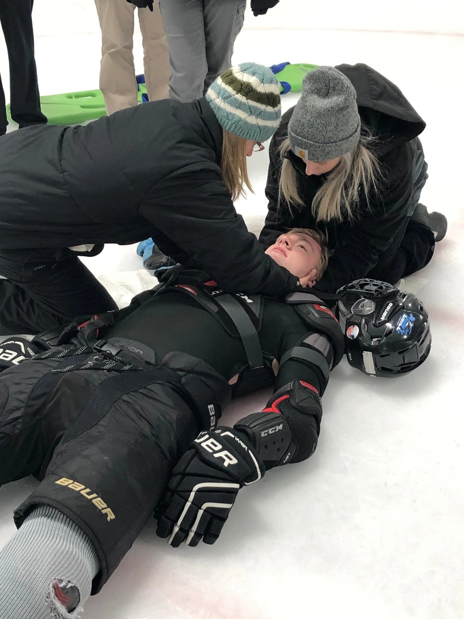 sports-physical-therapy-residents-evaluating-hockey-athlete