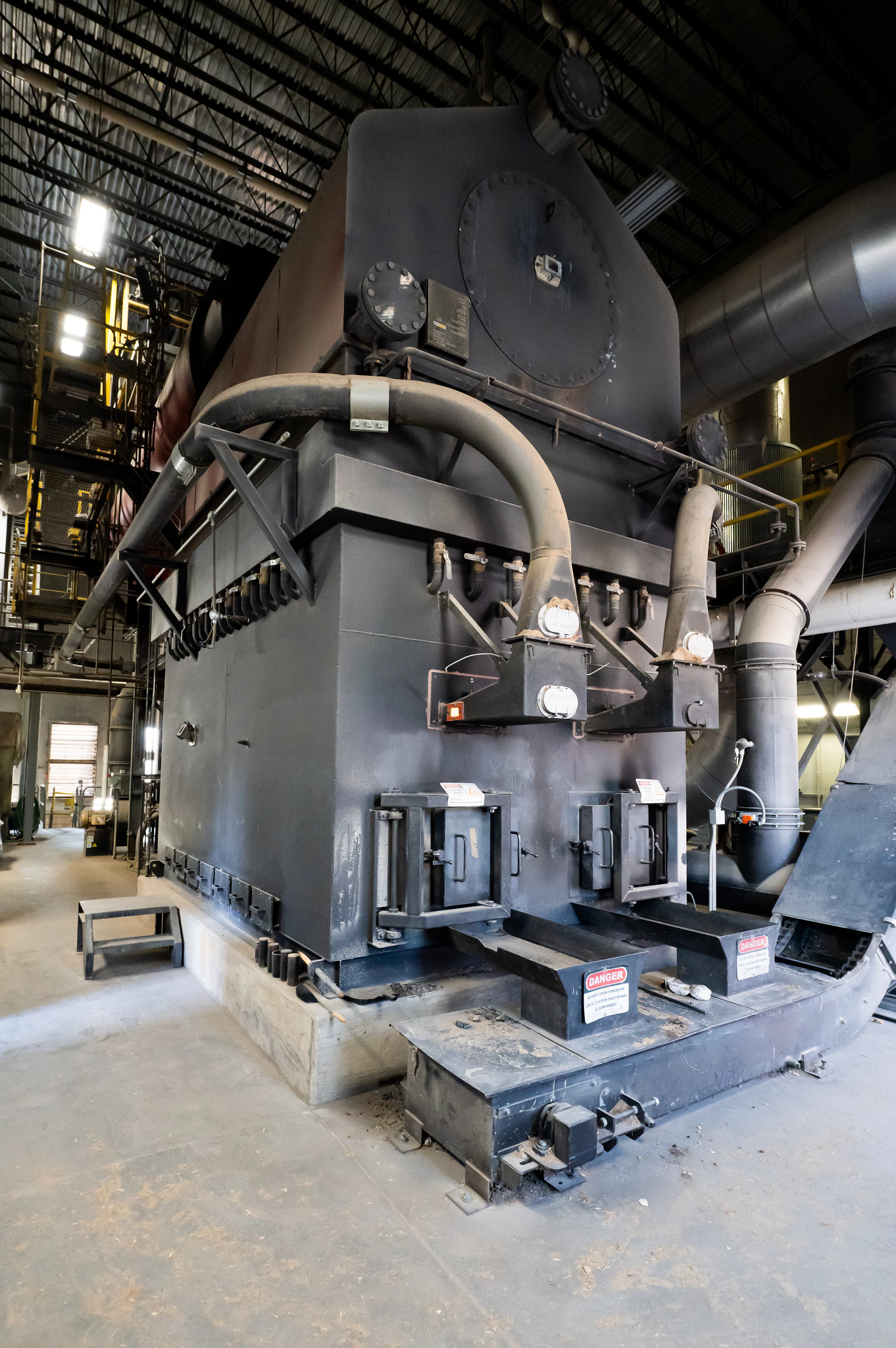 Biomass boiler where organic wood is used as a fuel source.