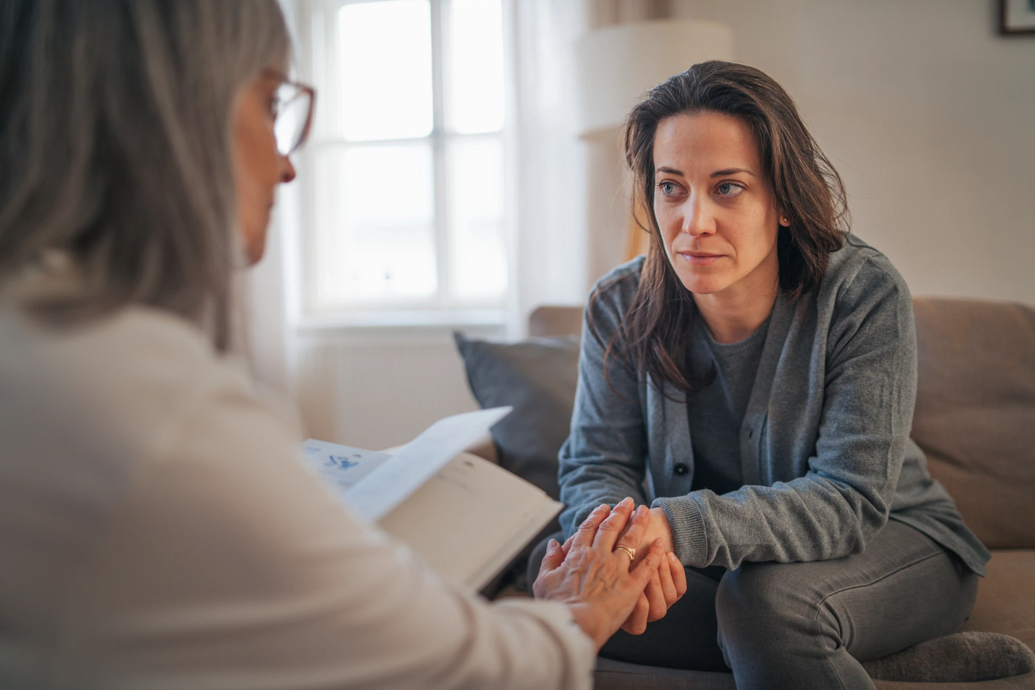 Woman in behavioral health therapy session.
