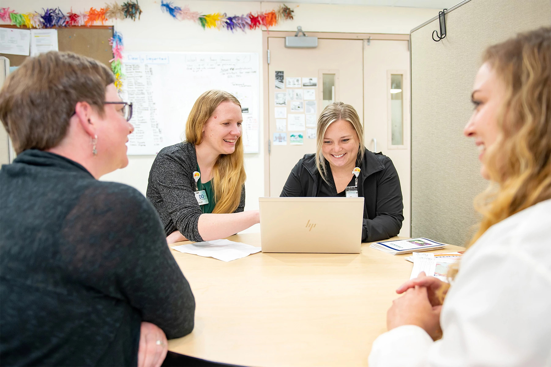 Hospice fellowship leaders together in meeting.