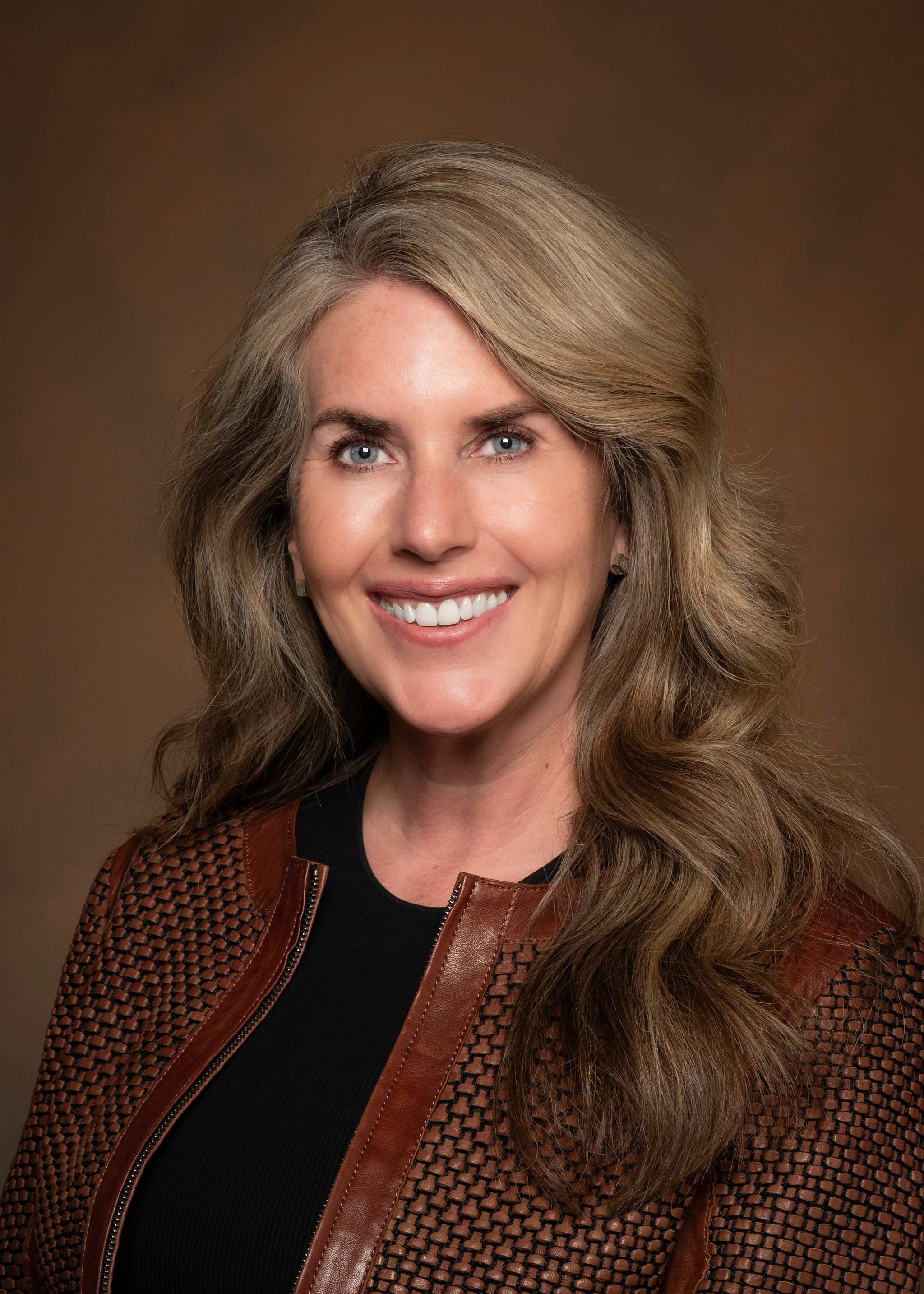 Professional portrait of Heather Schimmers.